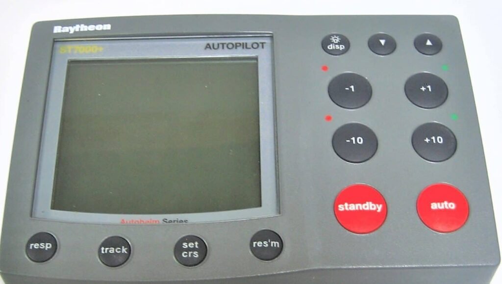An ST7000 Plus. Note the <strong>▼</strong> and <strong>▲</strong> keys along the top, beside <strong>disp</strong> — those are what you change the AutoTack value with on this head, not the -1 and +1 keys below them. The ST6000 Plus has no such pair, which is why the two units are operated differently.” width=”1024″ height=”579″ loading=”lazy” decoding=”async” style=”width:100%;height:auto;max-width:760px;border-radius:8px;” /><figcaption style=